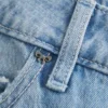 Jean baggy taille basse délavé clair à nœuds cloutés Jean baggy taille basse délavé clair à nœuds cloutés