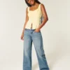 Jean baggy taille basse, délavage moyen, imprimé Los Angeles Jean baggy taille basse, délavage moyen, imprimé Los Angeles