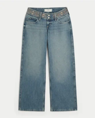 Jean baggy taille basse ultra basse, délavage moyen, brodé à la taille