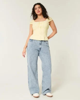 Jean baggy taille haute à lavage moyen et coupes courbes