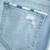Jean bootcut délavé clair à broderies et taille basse Jean bootcut délavé clair à broderies et taille basse