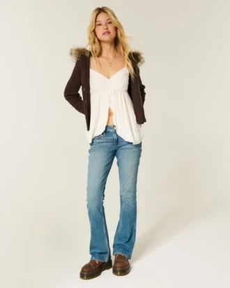 Jean bootcut taille basse délavé moyen à clous Jean bootcut taille basse délavé moyen à clous