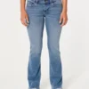 Jean bootcut taille basse délavage moyen Jean bootcut taille basse délavage moyen