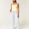 Jean droit taille haute délavé clair pour silhouettes rondes Jean droit taille haute délavé clair pour silhouettes rondes