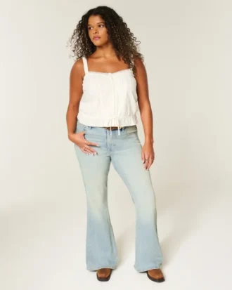 Jean flare taille haute délavé clair avec poche étoile