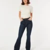 Jean flare taille haute foncé à coupe ajustée Jean flare taille haute foncé à coupe ajustée