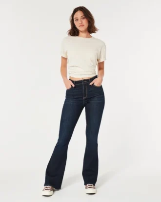 Jean flare taille haute foncé à coupe ajustée Jean flare taille haute foncé à coupe ajustée