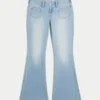 Jean flare taille ultra basse délavé clair avec poche avant Jean flare taille ultra basse délavé clair avec poche avant