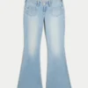 Jean flare taille ultra basse délavé clair avec poche avant Jean flare taille ultra basse délavé clair avec poche avant