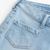 Jean flare taille ultra basse délavé clair avec poche avant Jean flare taille ultra basse délavé clair avec poche avant