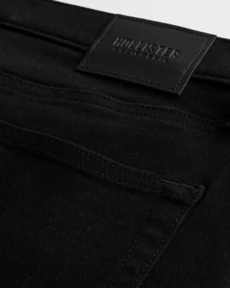 Jean skinny athlétique noir qui ne se décolore pas