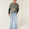 Jean super baggy délavé clair avec motif astronaute Jean super baggy délavé clair avec motif astronaute