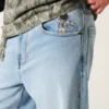 Jean super baggy délavé clair avec motif astronaute Jean super baggy délavé clair avec motif astronaute