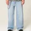 Jean super baggy délavé clair avec motif astronaute Jean super baggy délavé clair avec motif astronaute