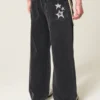 Jean super baggy noir délavé à motif étoile Jean super baggy noir délavé à motif étoile
