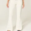 Jean évasé à poche brodée blanc ultra taille basse Jean évasé à poche brodée blanc ultra taille basse