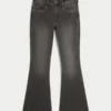 Jean évasé taille haute noir délavé brodé Jean évasé taille haute noir délavé brodé