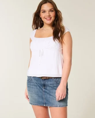 Mini-jupe-short en denim brodé taille basse