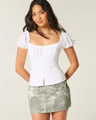 Mini-jupe-short en denim camouflage taille basse et courbes