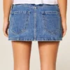 Mini-jupe-short en denim délavé moyen avec broderie en chaîne Mini-jupe-short en denim délavé moyen avec broderie en chaîne
