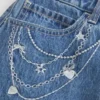 Mini-jupe-short en denim délavé moyen avec broderie en chaîne Mini-jupe-short en denim délavé moyen avec broderie en chaîne