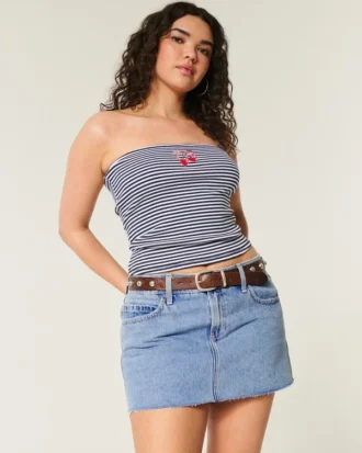 Mini-jupe-short en denim taille basse, coupe ajustée, délavage moyen