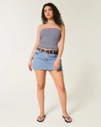 Mini-jupe-short en denim taille basse, coupe ajustée, délavage moyen