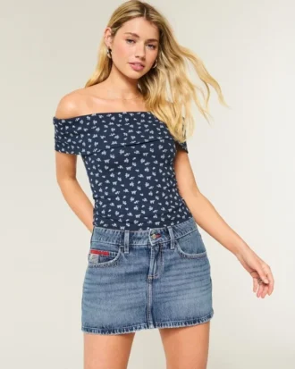 Mini-jupe-short en denim à taille basse, délavage moyen et broderie drapeau