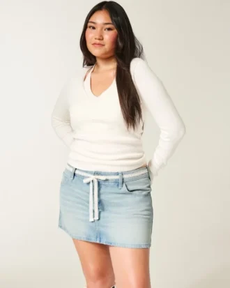 Mini-jupe-short en denim à taille basse et lacets en dentelle