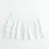 Mini-jupe-short en tricot à volants Mini-jupe-short en tricot à volants