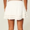 Mini-jupe-short à ourlet en dentelle