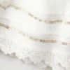 Mini-jupe-short à ourlet en dentelle