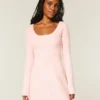 Mini-robe babydoll à nouer dans le dos Mini-robe babydoll à nouer dans le dos
