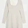Mini-robe babydoll à nouer dans le dos Mini-robe babydoll à nouer dans le dos
