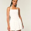 Mini-robe dos nu à taille basse Mini-robe dos nu à taille basse
