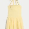 Mini-robe dos nu à taille basse