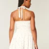 Mini-robe dos nu à taille basse Mini-robe dos nu à taille basse