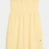 Mini-robe sans bretelles en tissu éponge Mini-robe sans bretelles en tissu éponge