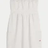 Mini-robe sans bretelles en tissu éponge Mini-robe sans bretelles en tissu éponge