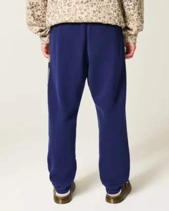 Pantalon de jogging ample en molleton avec imprimé graphique Wolverines de l’université du Michigan Pantalon de jogging ample en molleton avec imprimé graphique Wolverines de l’université du Michigan