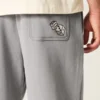 Pantalon de survêtement ample à motif dés Pantalon de survêtement ample à motif dés
