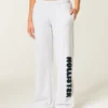 Pantalon de survêtement à jambes larges avec logo graphique Pantalon de survêtement à jambes larges avec logo graphique