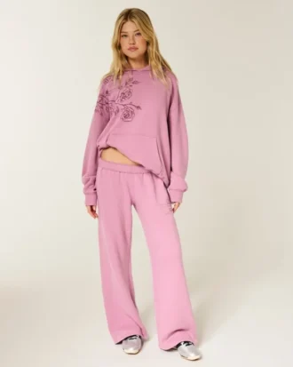 Pantalon de survêtement à jambes larges avec motif rose scintillant