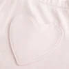 Pantalon de survêtement à jambes larges avec poche en forme de cœur Pantalon de survêtement à jambes larges avec poche en forme de cœur