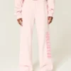 Pantalon de survêtement à jambes larges et logo