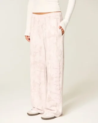 Pantalon de survêtement large à logo graphique rose camouflage