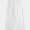 Pantalon de survêtement large à logo scintillant Pantalon de survêtement large à logo scintillant