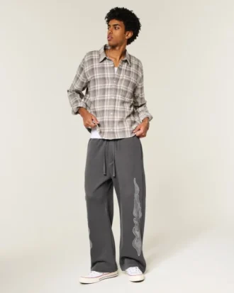 Pantalon de survêtement super baggy avec motif double flamme
