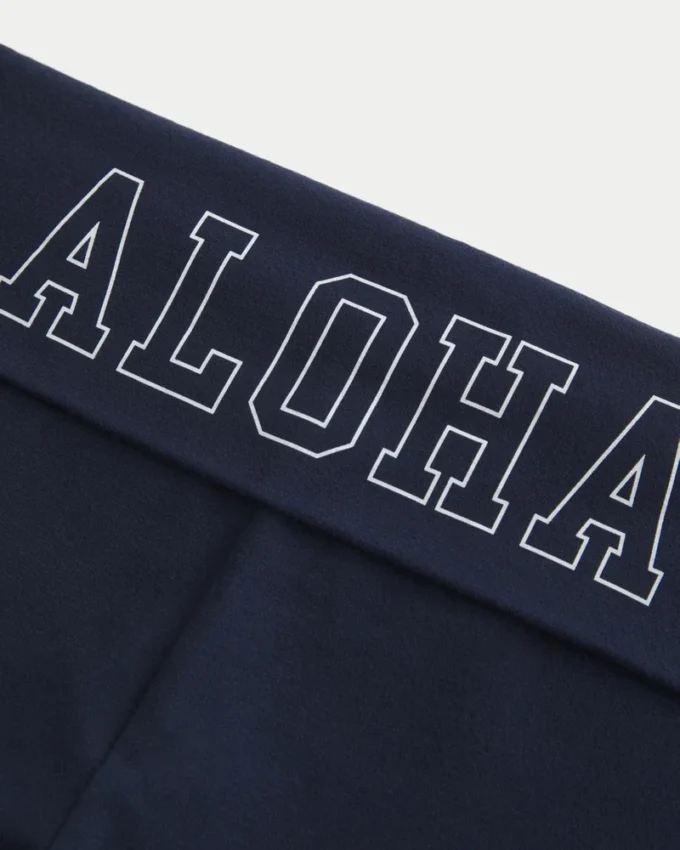 Pantalon évasé à taille repliée et imprimé Aloha