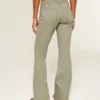 Pantalon évasé à taille ultra basse et broderies Pantalon évasé à taille ultra basse et broderies